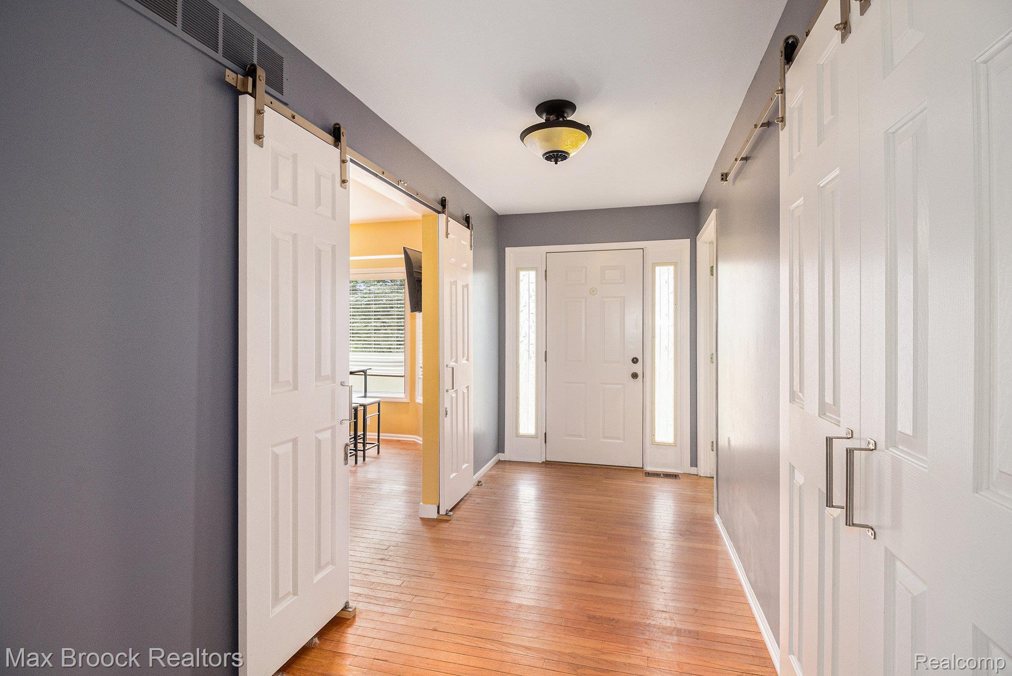 5096 Ridge Trail South Clarkston, MI 48348 - Photo 4 of 31 Formal Foyer Entry with Sliding Barn Doors