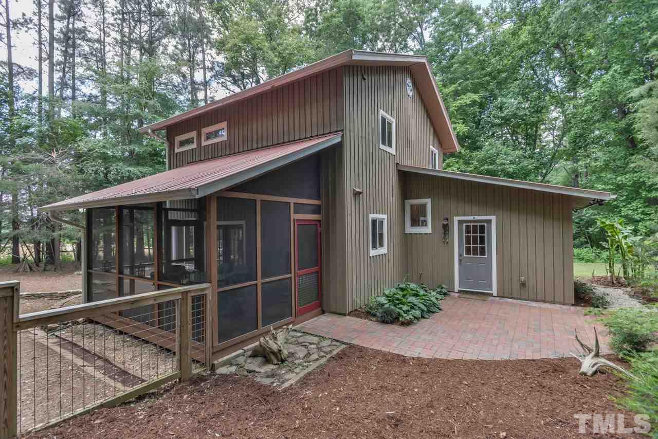 8710 Morrow Mill Road Mebane, NC 27302 - Photo 3 of 24 Great screened porch for catching a breeze and a breather!
