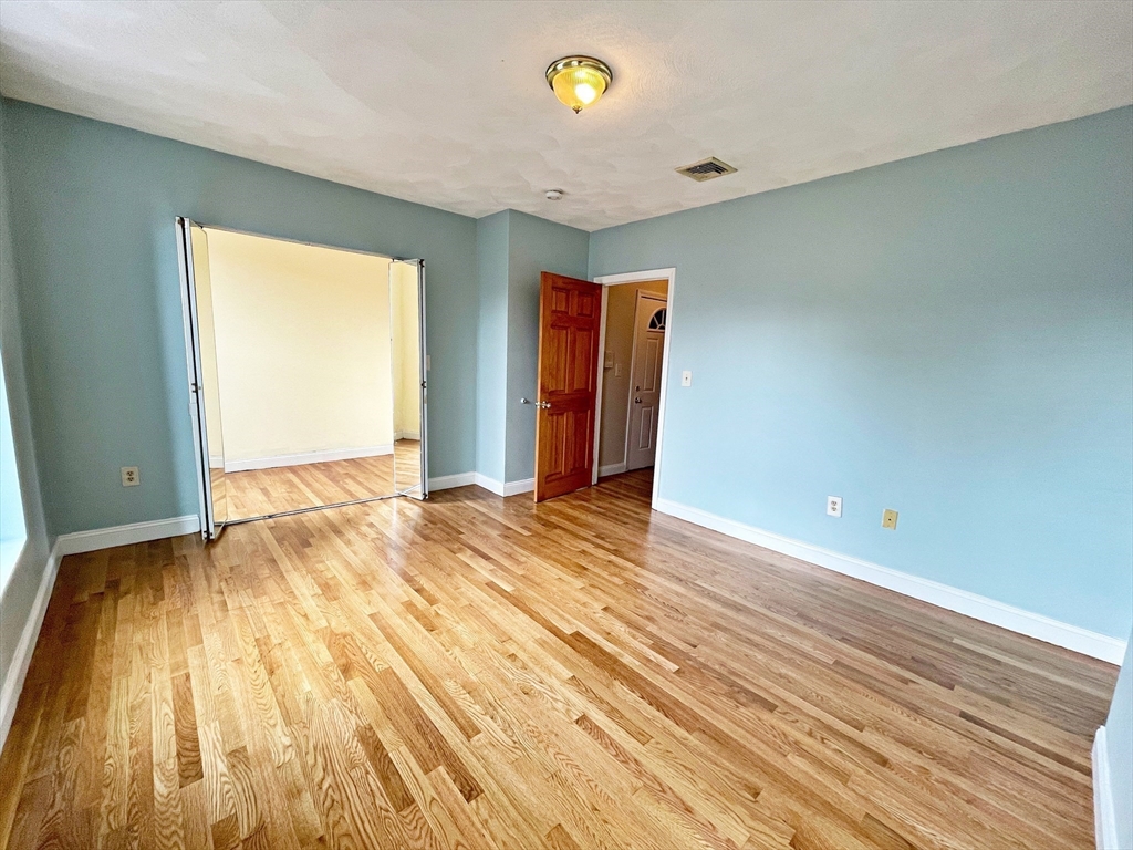 64 Trenton Street Boston, MA 02128 - Photo 22 of 34 a view of an empty room and window