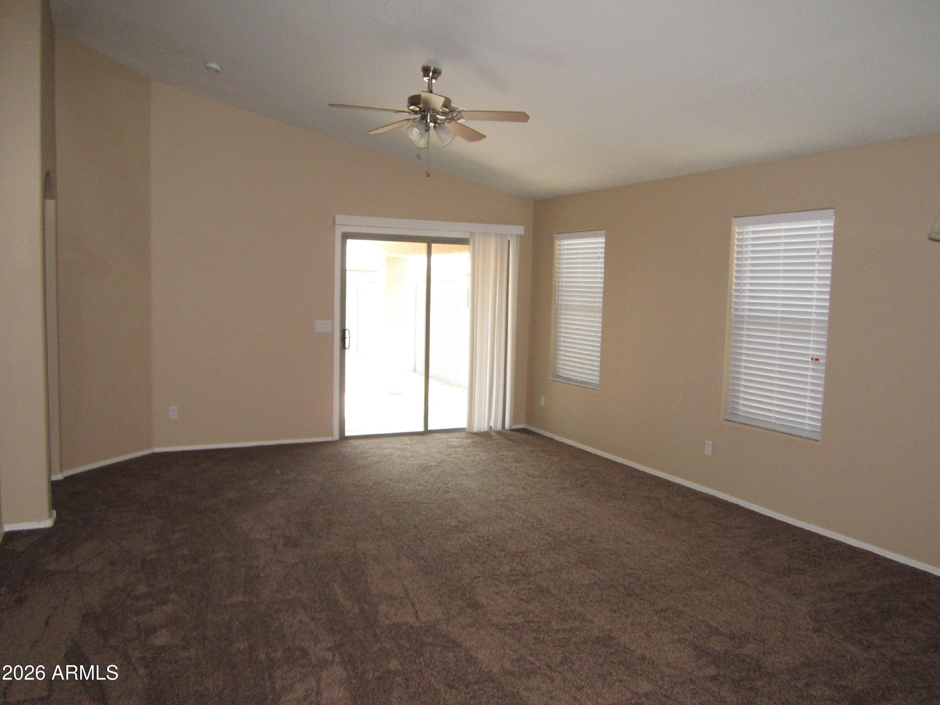 18671 North Madison Road Maricopa, AZ 85139 - Photo 24 of 27 a view of an empty room with a window