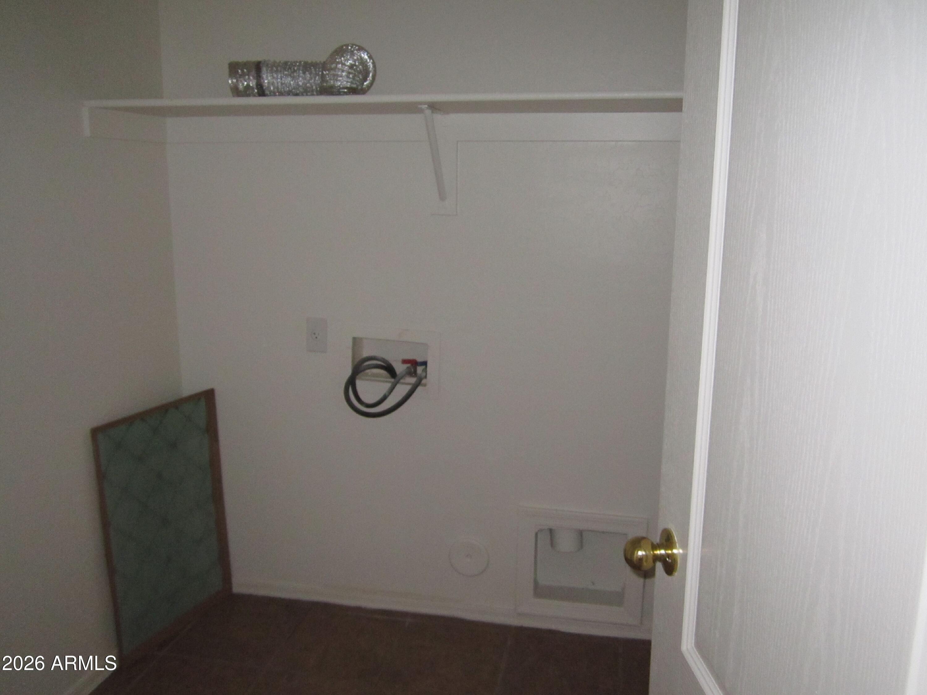 18671 North Madison Road Maricopa, AZ 85139 - Photo 26 of 27 a bathroom with a shower