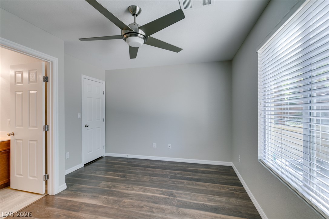 4650 Ranch House Road, Unit 46 North Las Vegas, NV 89031 - Photo 5 of 38 Gleaming wood-look floors complement clean lines and abundant natural light.
