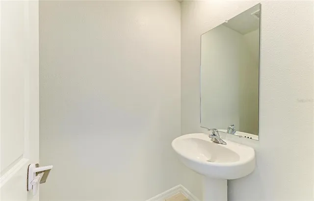 a bedroom with a bed and a closet