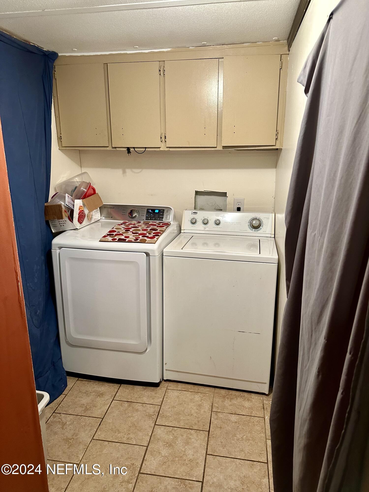 3140 Green Acres Road St. Augustine, FL 32084 - Photo 9 of 15 a utility room with dryer and washer