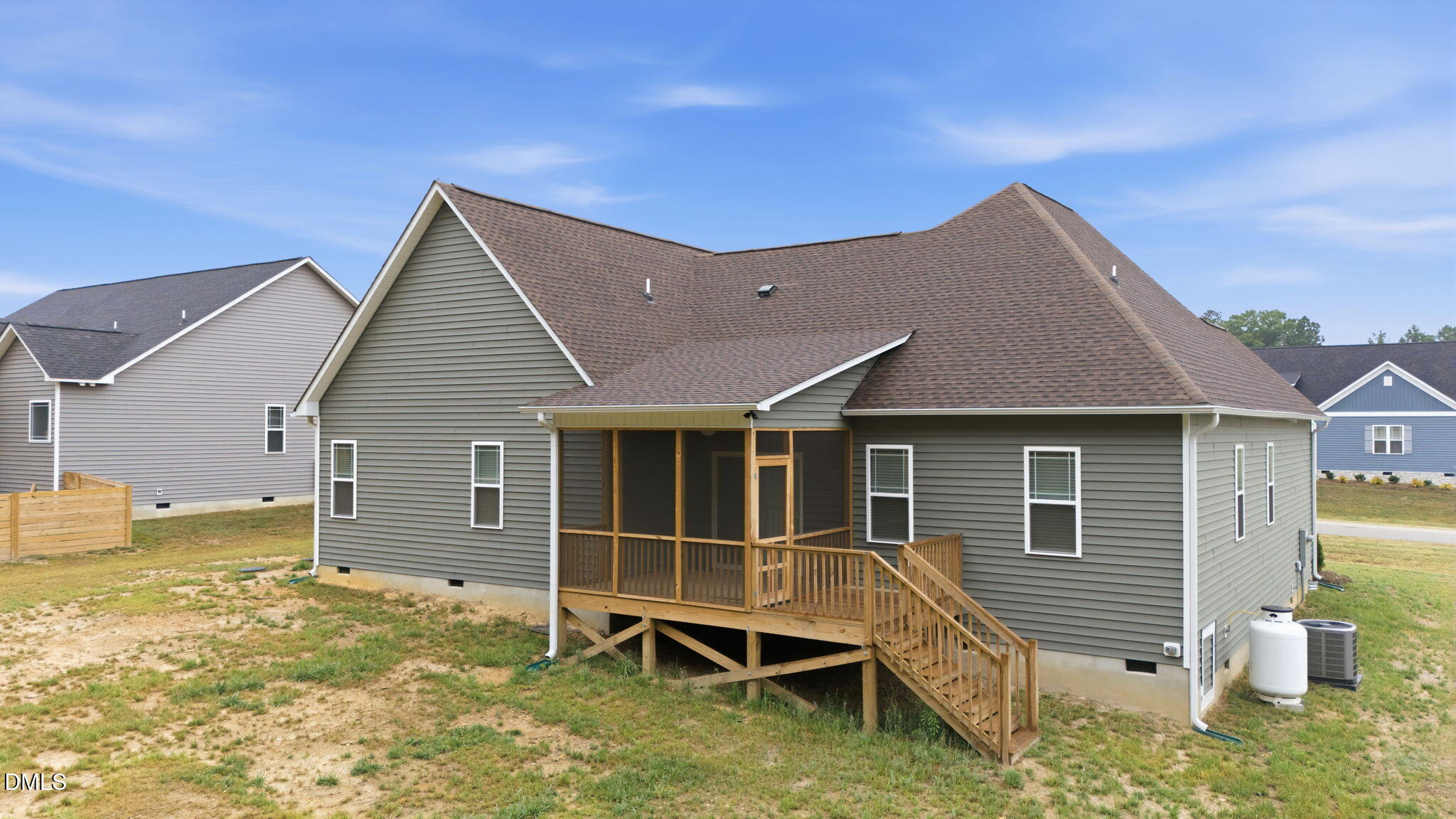 146 Seahawk Way Zebulon, NC 27597 - Photo 39 of 51 a backyard of a house with table and chairs
