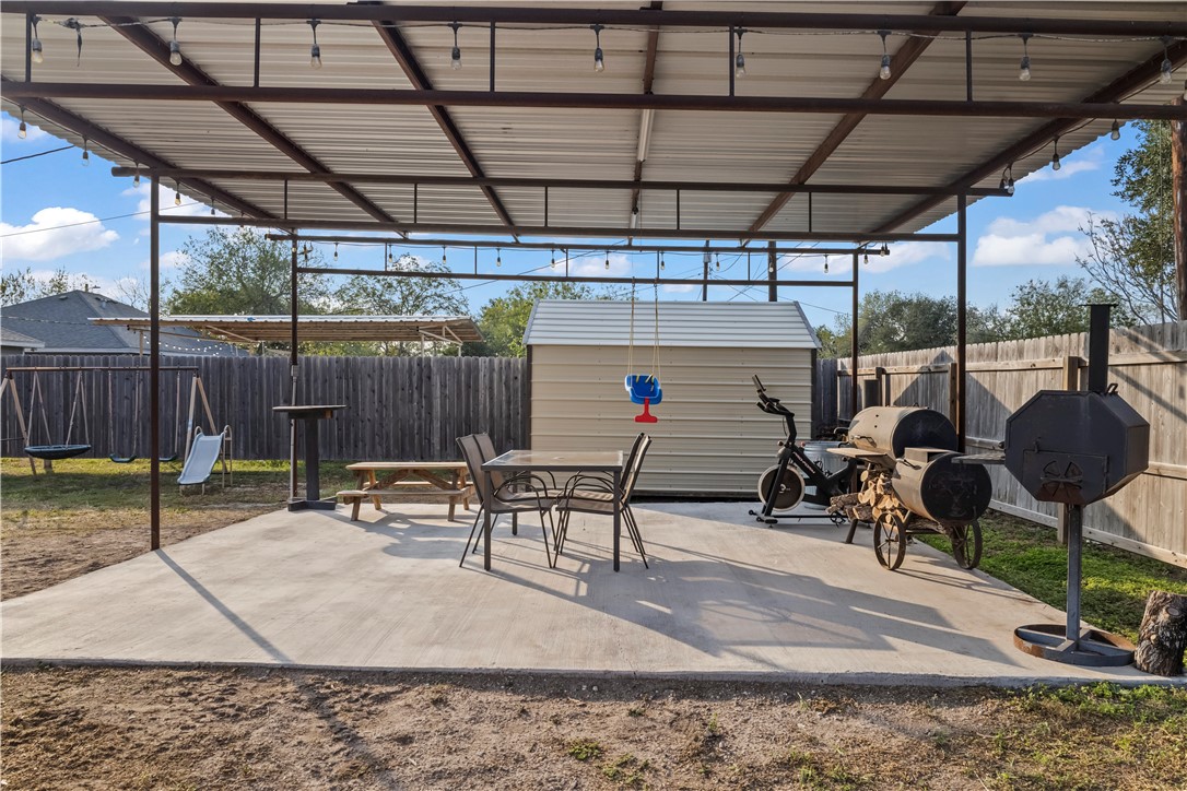200 West 4th Street Alice, TX 78332 - Photo 18 of 19 a view of a porch with furniture and a table