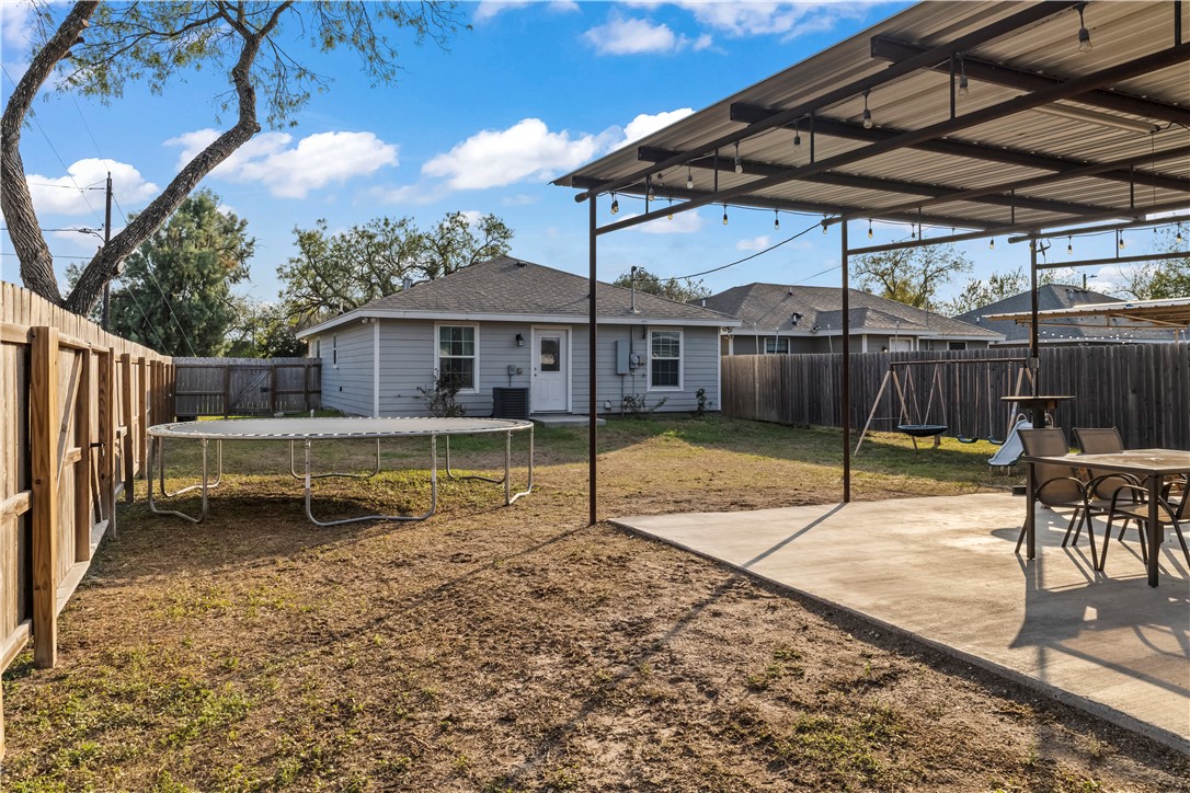 200 West 4th Street Alice, TX 78332 - Photo 19 of 19 a house view with a backyard space