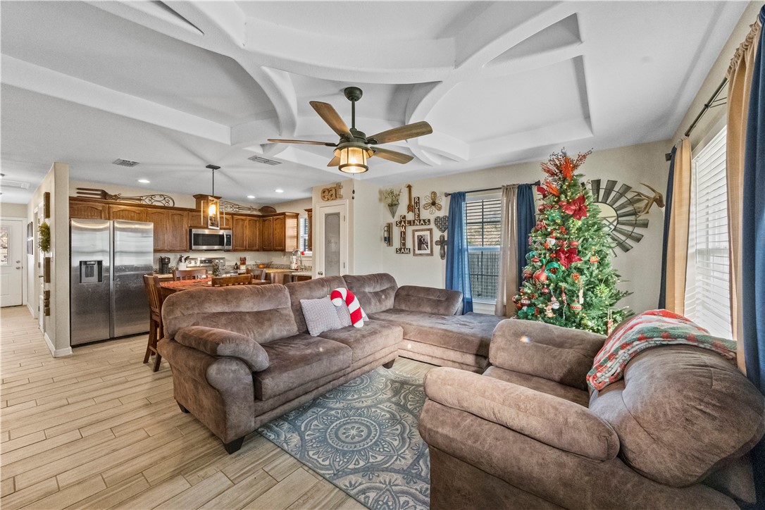 200 West 4th Street Alice, TX 78332 - Photo 4 of 19 a living room with furniture kitchen and a chandelier