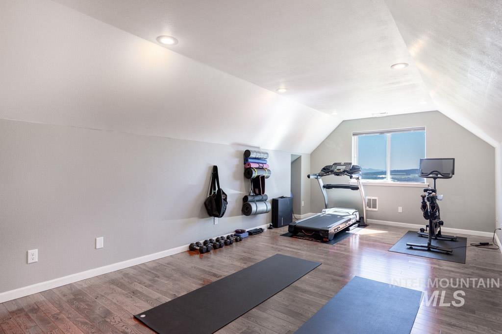 1049 Libey Road Viola, ID 83872 - Photo 20 of 43 Versatile bonus room with sloped ceilings and recessed lighting