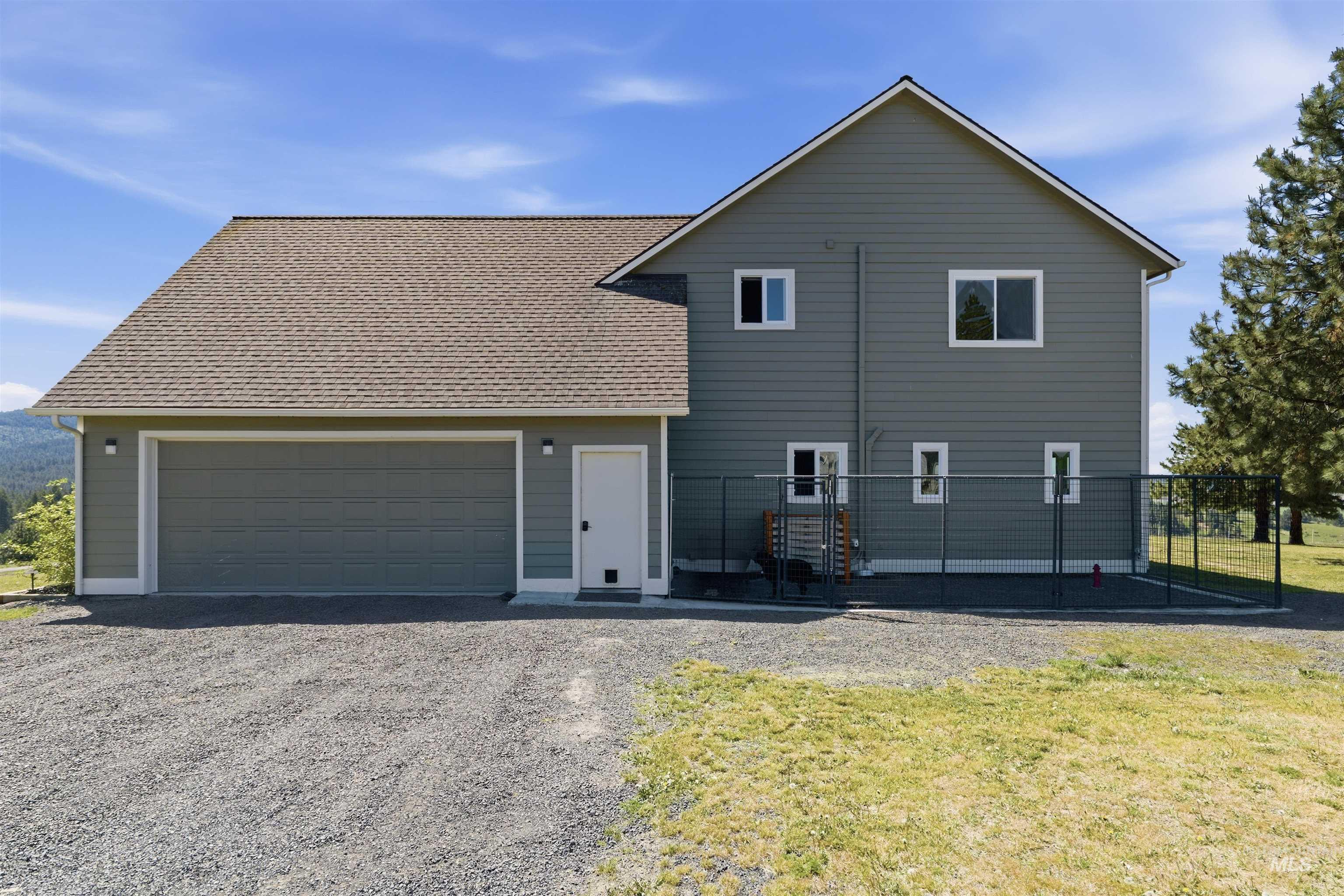 1049 Libey Road Viola, ID 83872 - Photo 30 of 43 Two-story residence featuring horizontal siding and a multi-pitch roofline