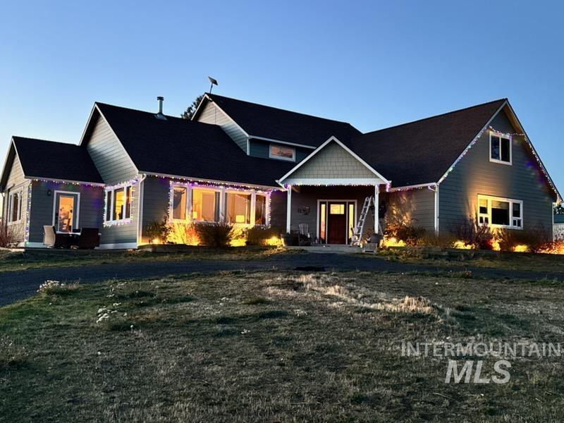 1049 Libey Road Viola, ID 83872 - Photo 42 of 43 Multi-level residence featuring gray siding and dark shingle roofing