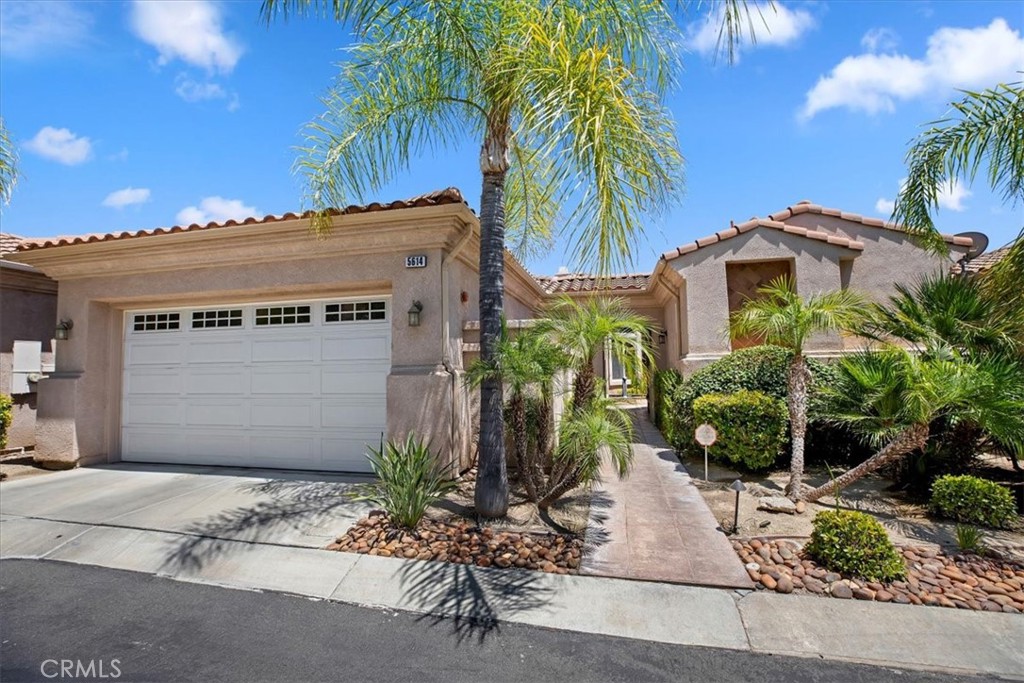 a front view of house with yard