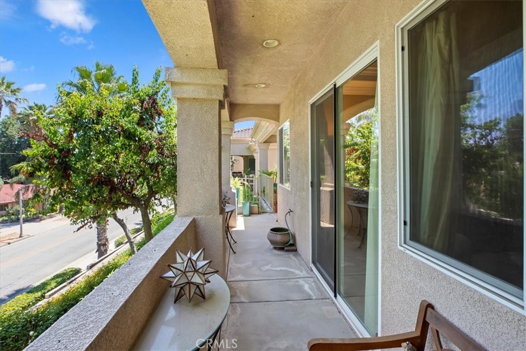 5614 Queen Palms Drive Riverside, CA 92506 - Photo 13 of 50 a view of balcony and living room