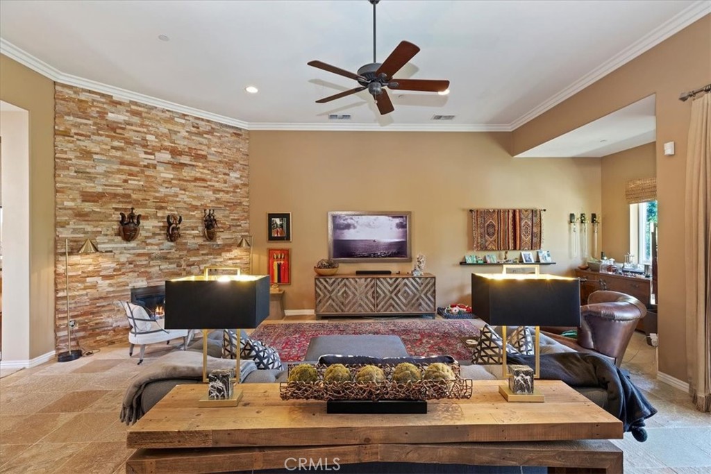 5614 Queen Palms Drive Riverside, CA 92506 - Photo 21 of 50 a living room with furniture and wooden floor