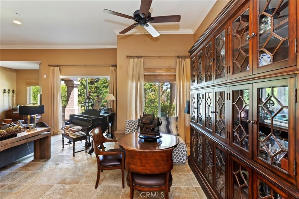 5614 Queen Palms Drive Riverside, CA 92506 - Photo 31 of 50 a living room with furniture and a large window