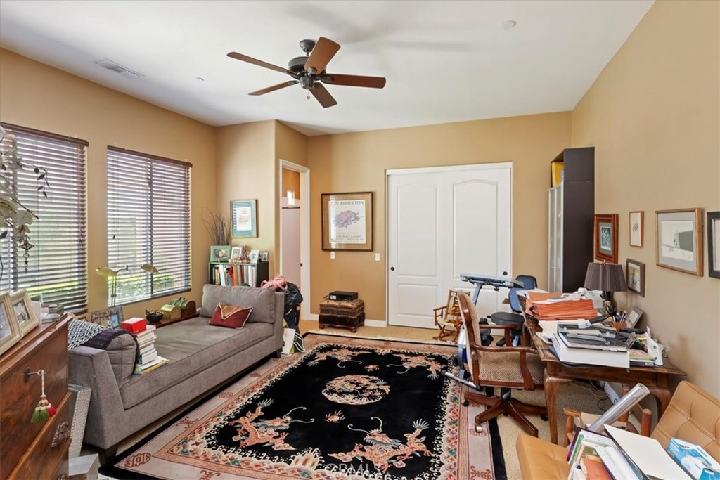 5614 Queen Palms Drive Riverside, CA 92506 - Photo 33 of 50 a living room with furniture and a large window