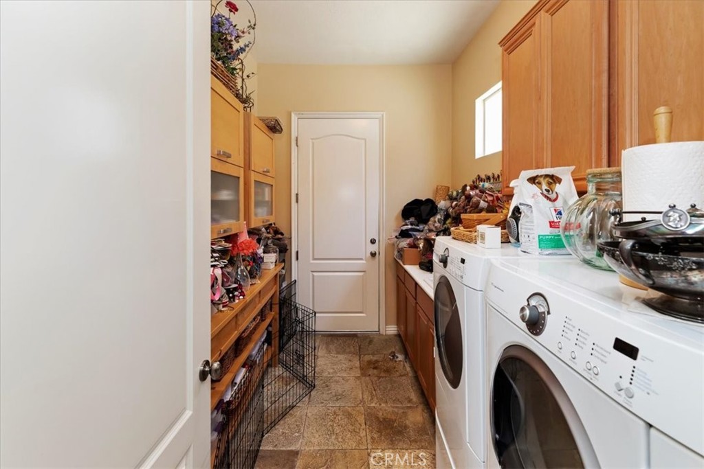 5614 Queen Palms Drive Riverside, CA 92506 - Photo 36 of 50 a view of utility room with washer and dryer