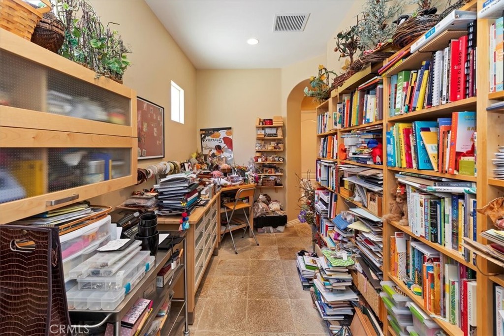 5614 Queen Palms Drive Riverside, CA 92506 - Photo 38 of 50 a city street filled with lots of wooden furniture