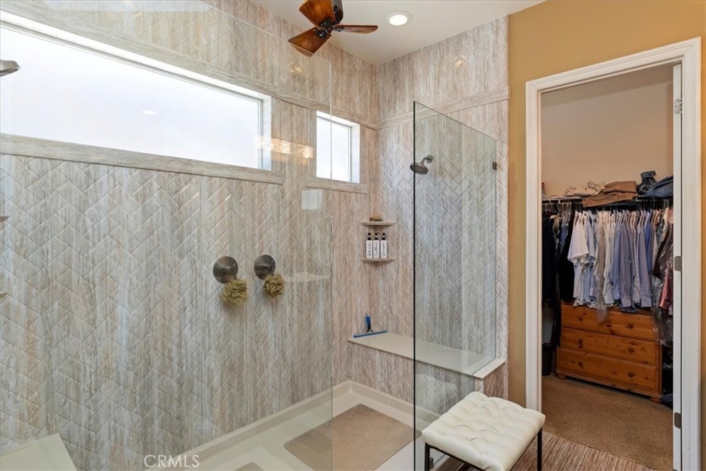 5614 Queen Palms Drive Riverside, CA 92506 - Photo 41 of 50 a bathroom with a shower and a sink