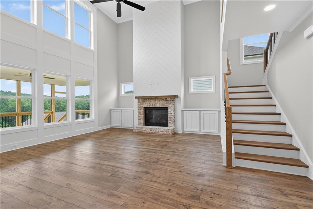 3787 Cheyenne Lane Jefferson, GA 30549 - Photo 12 of 82 a view of an empty room with wooden floor and a window