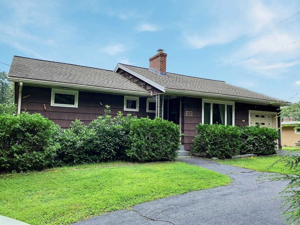 330 Hollis Road Lunenburg, MA 01462 - Photo 3 of 22 a front view of house with yard and green space