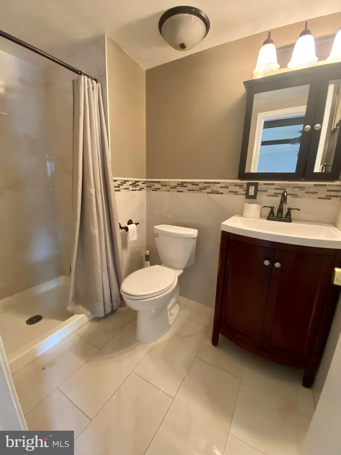 12412 Ransom Drive Glenn Dale, MD 20769 - Photo 11 of 22 Main level bathroom