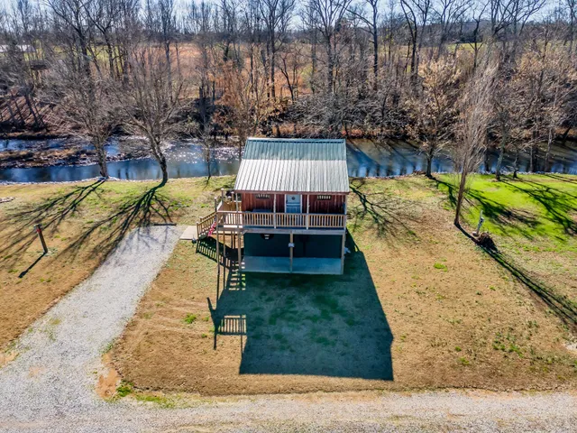 a view of a balcony with wooden floor