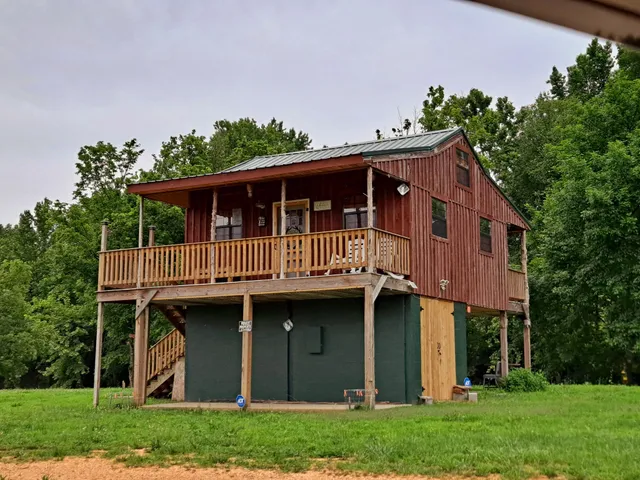 a view of a living room with a large window