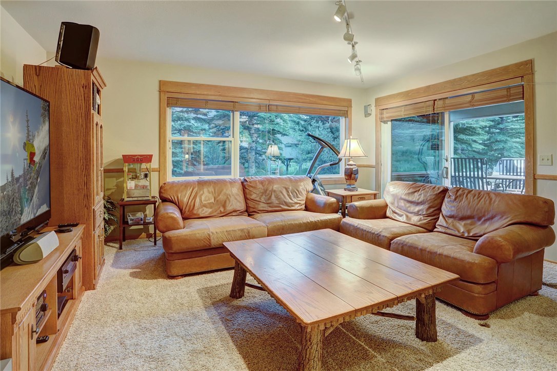 385 Riverside Drive Silverthorne, CO 80498 - Photo 12 of 35 Not just one but two living spaces! This large family room is just down the hall from the kitchen.