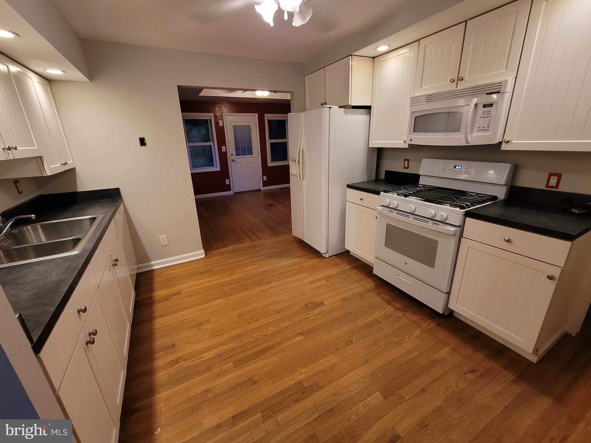10220 Meredith Avenue Silver Spring, MD 20910 - Photo 14 of 19 Kitchen Looking into Family Room