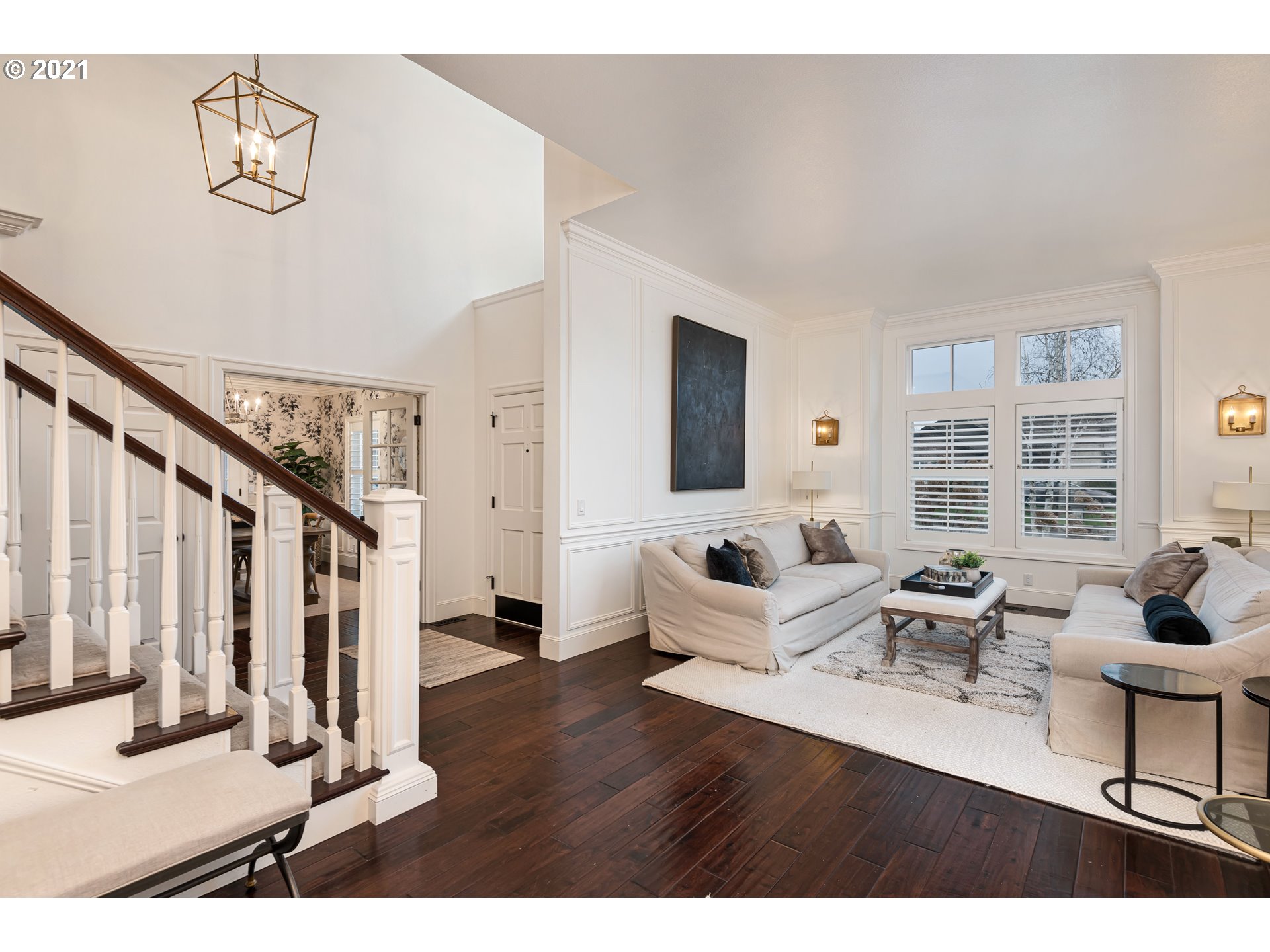 1703 Victorian Way Eugene, OR 97401 - Photo 2 of 32 a living room with furniture and a flat screen tv