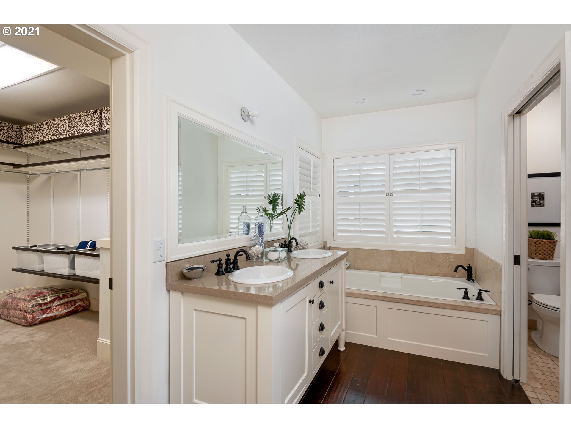 1703 Victorian Way Eugene, OR 97401 - Photo 13 of 32 a bathroom with a sink and a bathtub