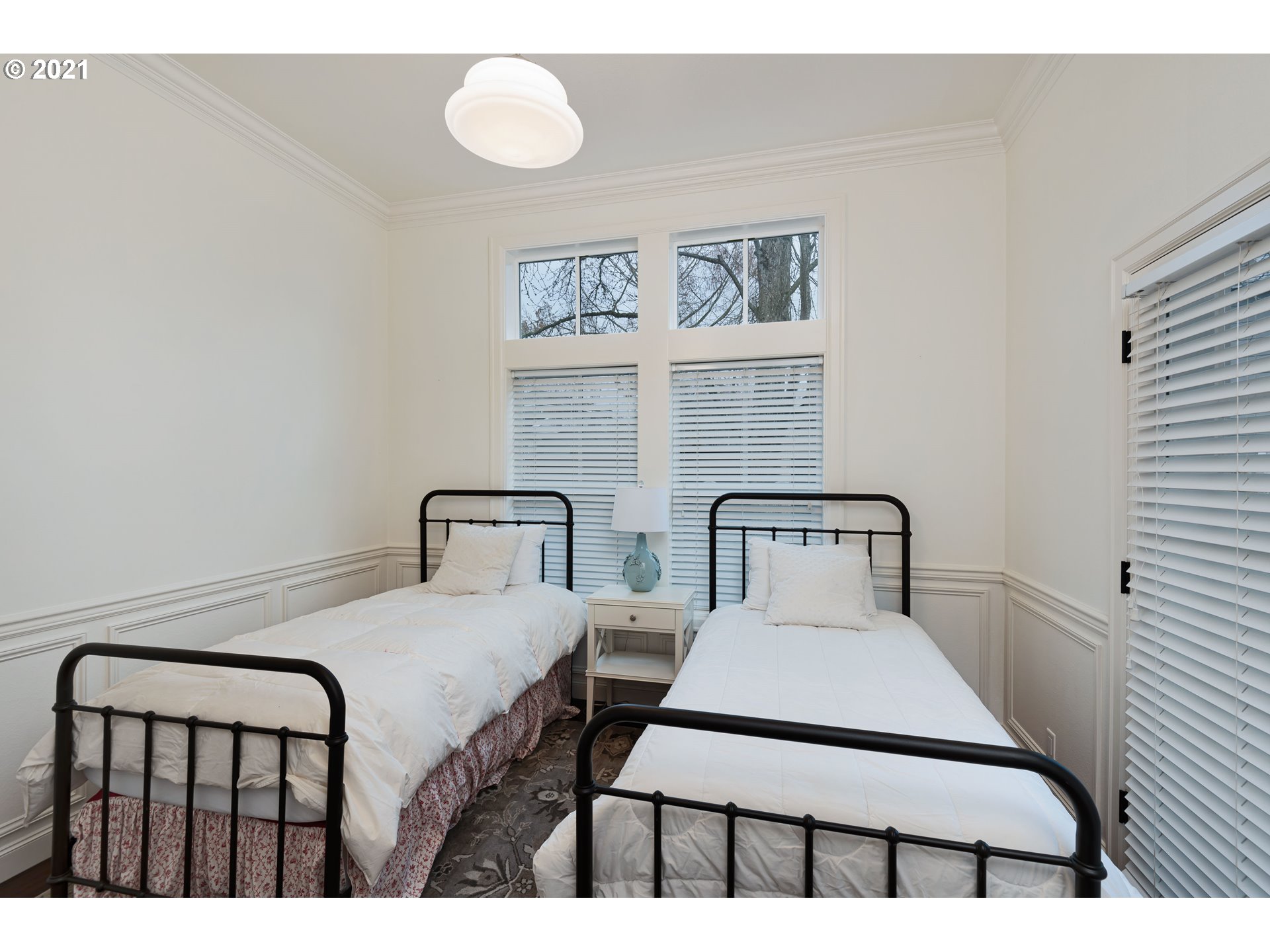 1703 Victorian Way Eugene, OR 97401 - Photo 16 of 32 a bedroom with a bed and a table