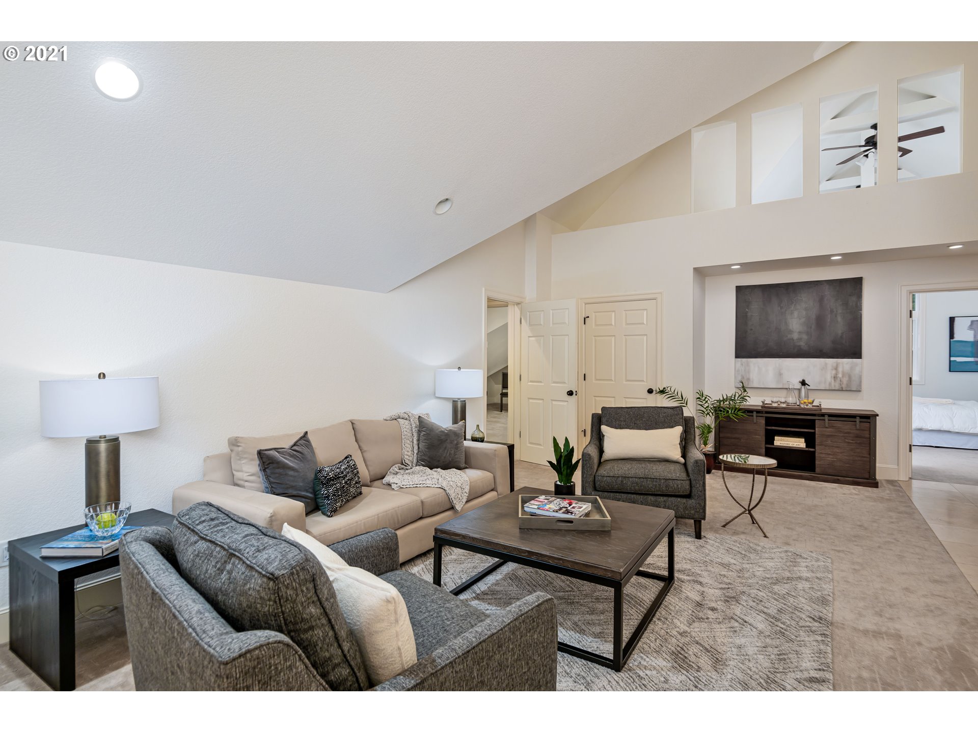 1703 Victorian Way Eugene, OR 97401 - Photo 22 of 32 a living room with furniture and a flat screen tv