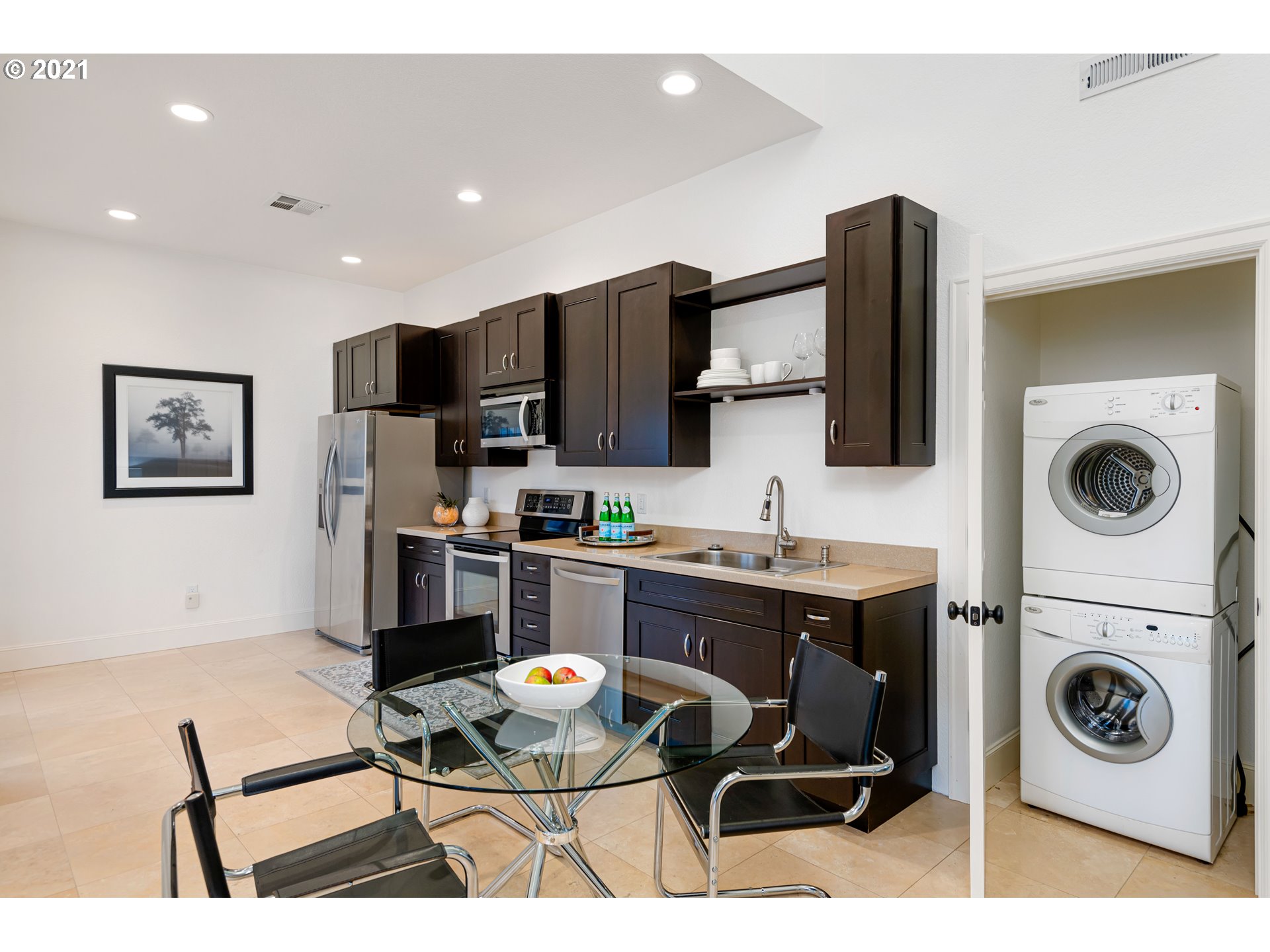 1703 Victorian Way Eugene, OR 97401 - Photo 24 of 32 a living room with furniture and a flat screen tv