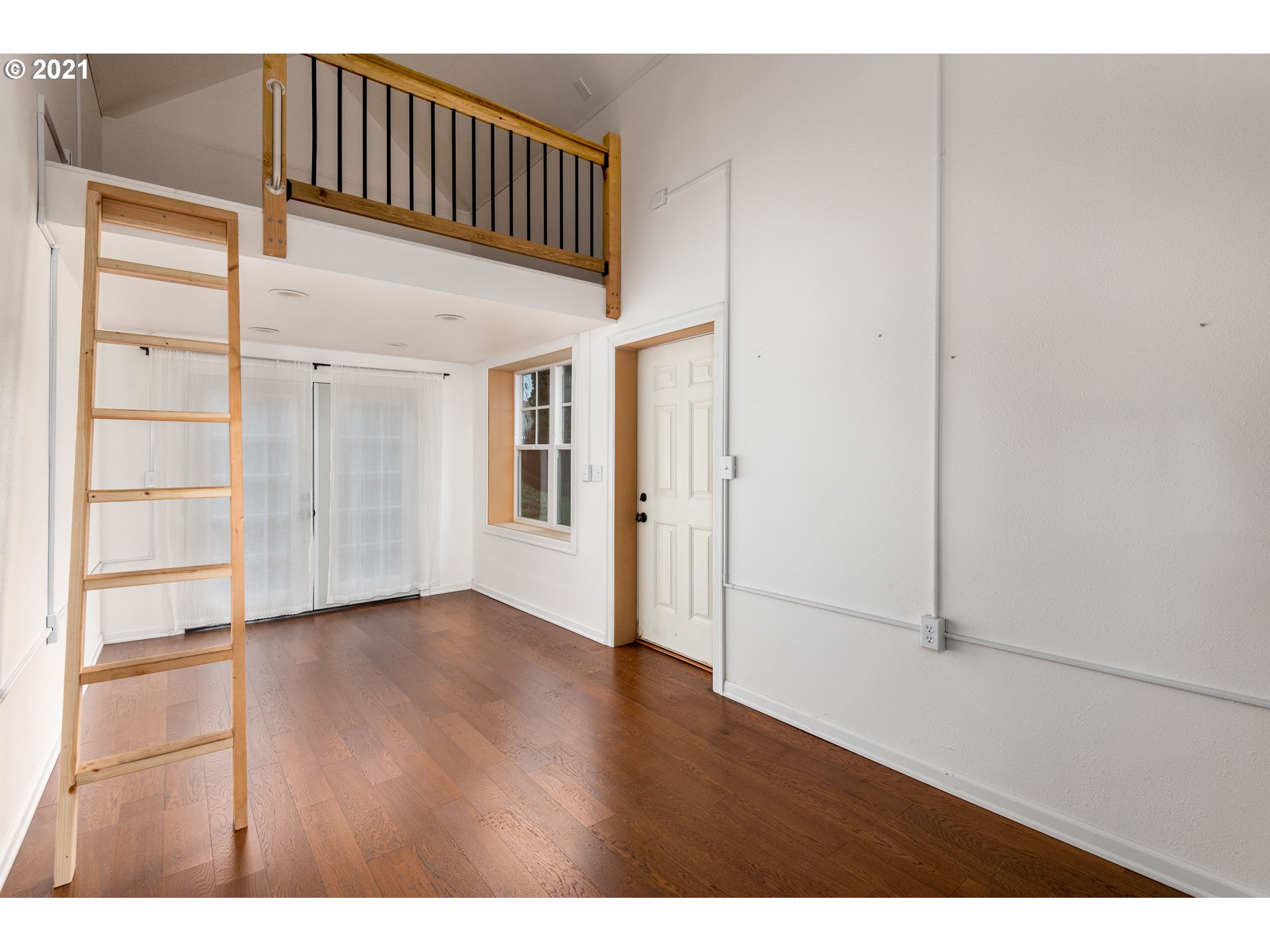 1703 Victorian Way Eugene, OR 97401 - Photo 28 of 32 a view of a porch with wooden floor