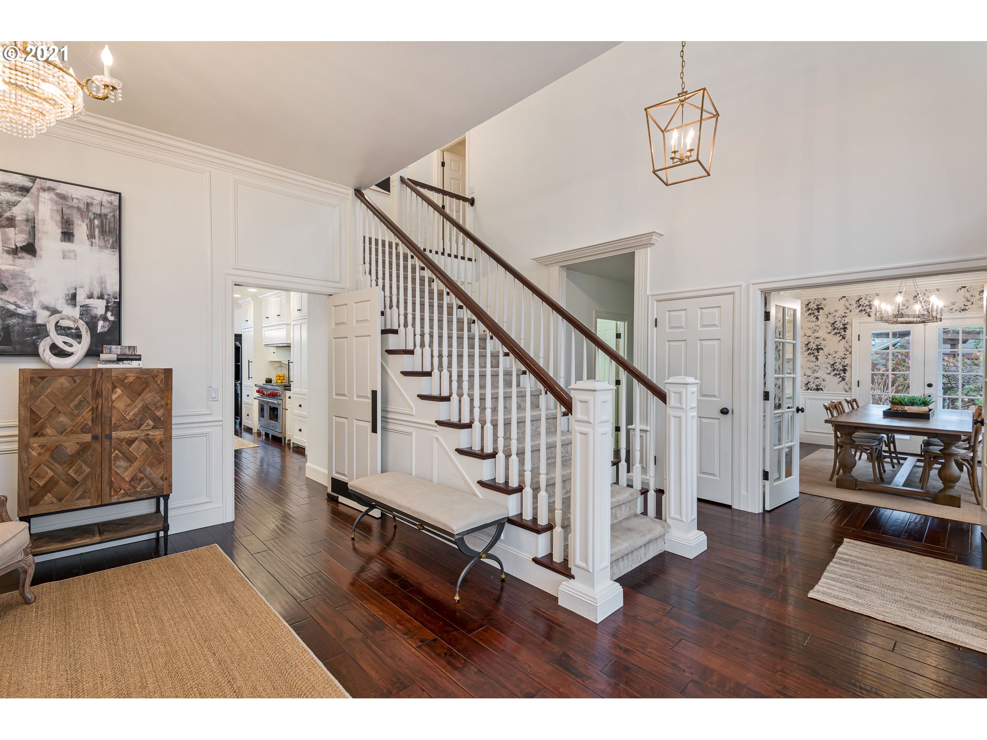 1703 Victorian Way Eugene, OR 97401 - Photo 4 of 32 a view of entryway with livingroom and wooden floor