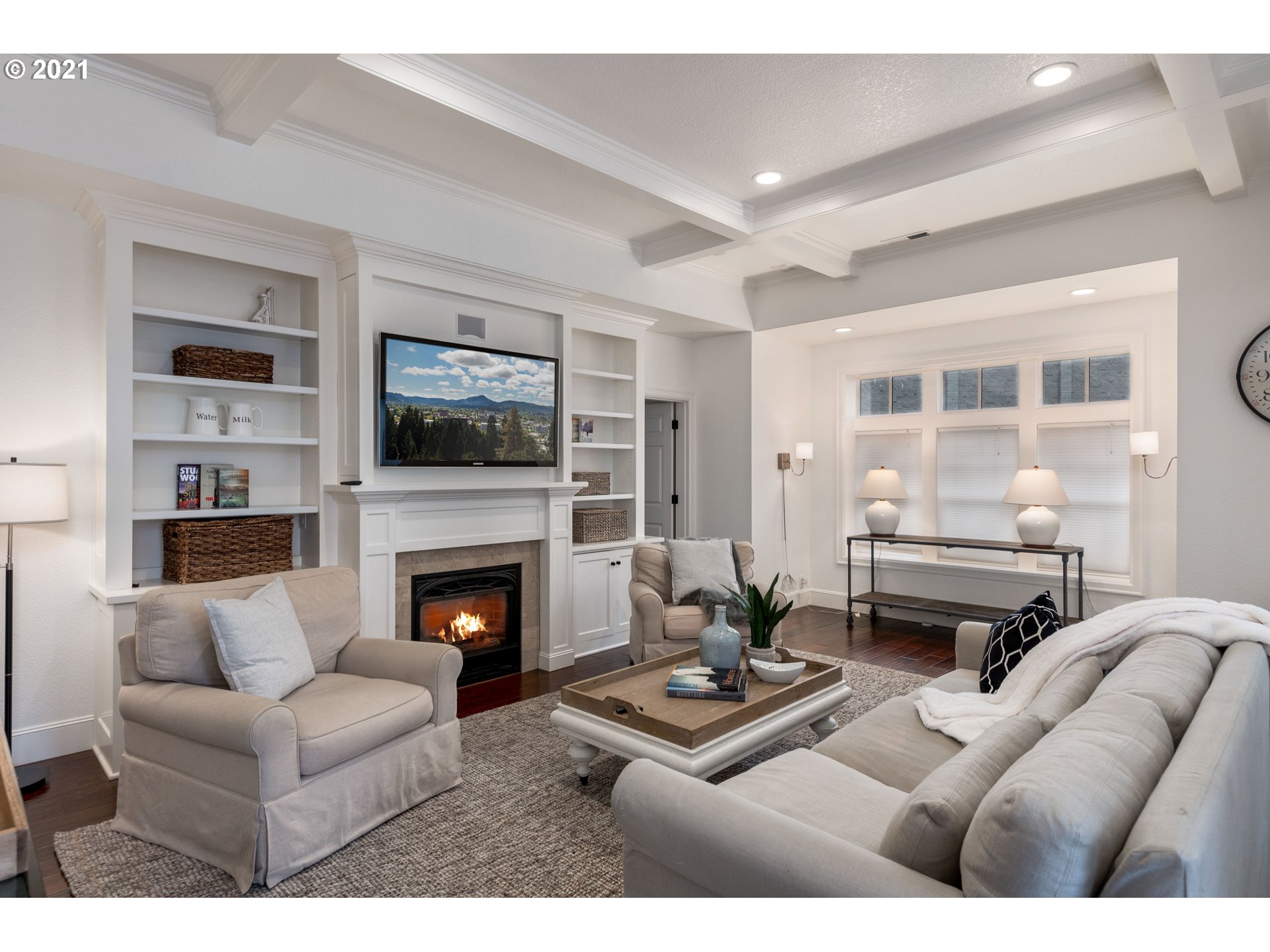 1703 Victorian Way Eugene, OR 97401 - Photo 10 of 32 a living room with furniture fireplace and flat screen tv