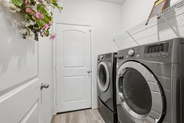 a utility room with dryer and washer