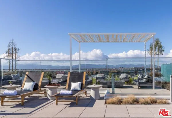 a view of a terrace with seating space