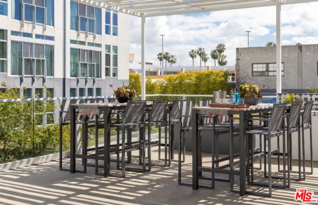 4210 Del Rey Avenue, Unit 501 Marina del Rey, CA 90292 - Photo 7 of 10 a view of a balcony with chairs