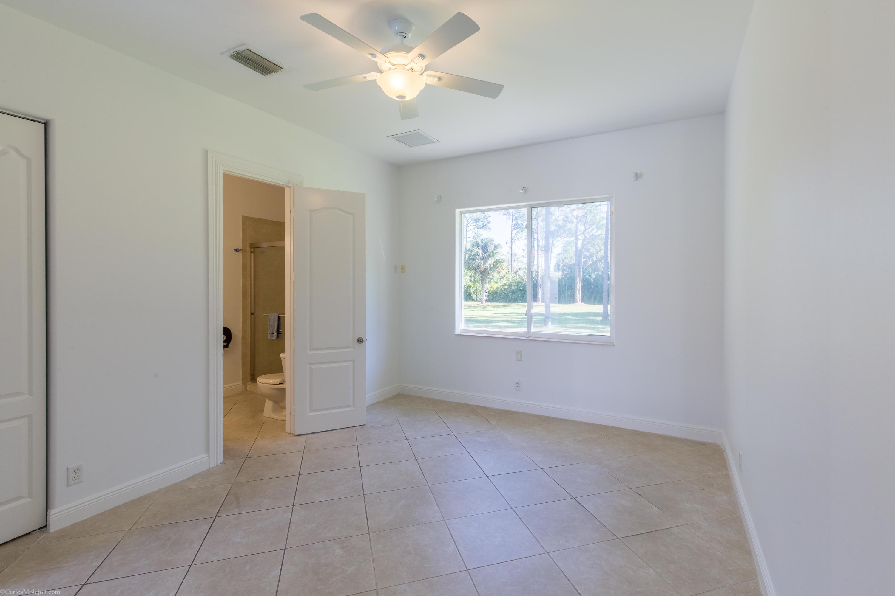 12981 Casey Road Loxahatchee, FL 33470 - Photo 52 of 86 Guest Bedroom 3