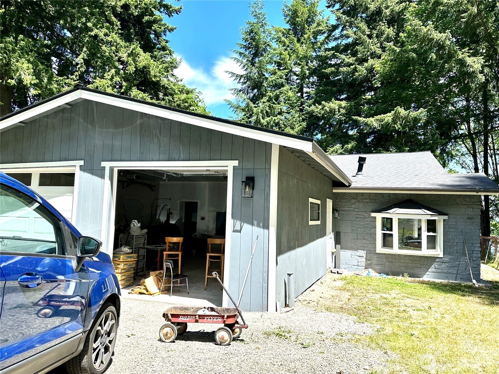 a house with trees in the background