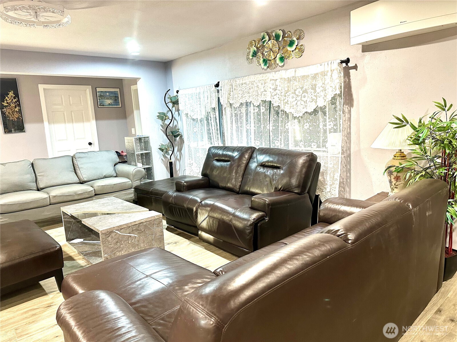 1302 Southwest Bay Street Port Orchard, WA 98366 - Photo 2 of 17 a living room with furniture and a large window