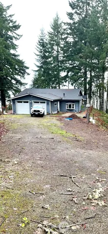 a view of a swimming pool with an outdoor space and seating area