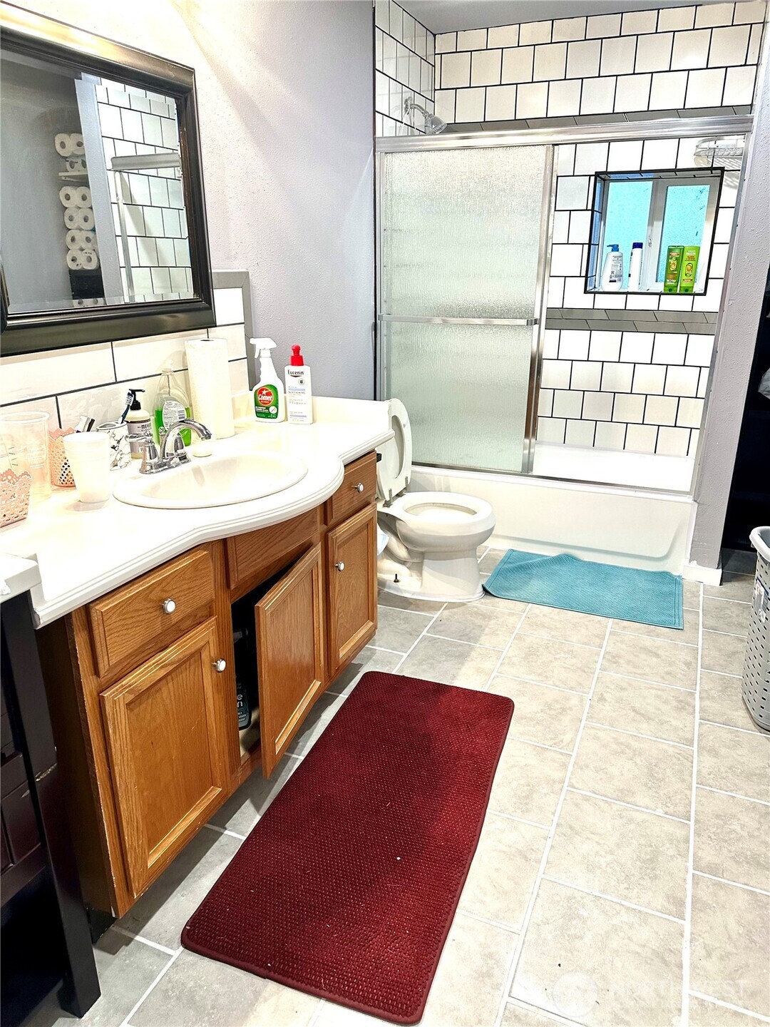 1302 Southwest Bay Street Port Orchard, WA 98366 - Photo 4 of 17 a bathroom with a sink a vanity and a mirror