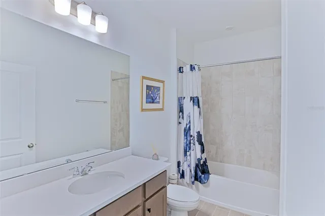 a balcony with couch and outdoor views