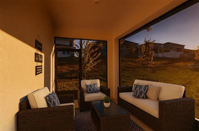 a view of a room with a large window