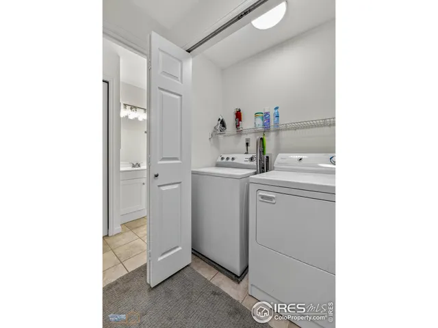 a room with a sink and cabinets