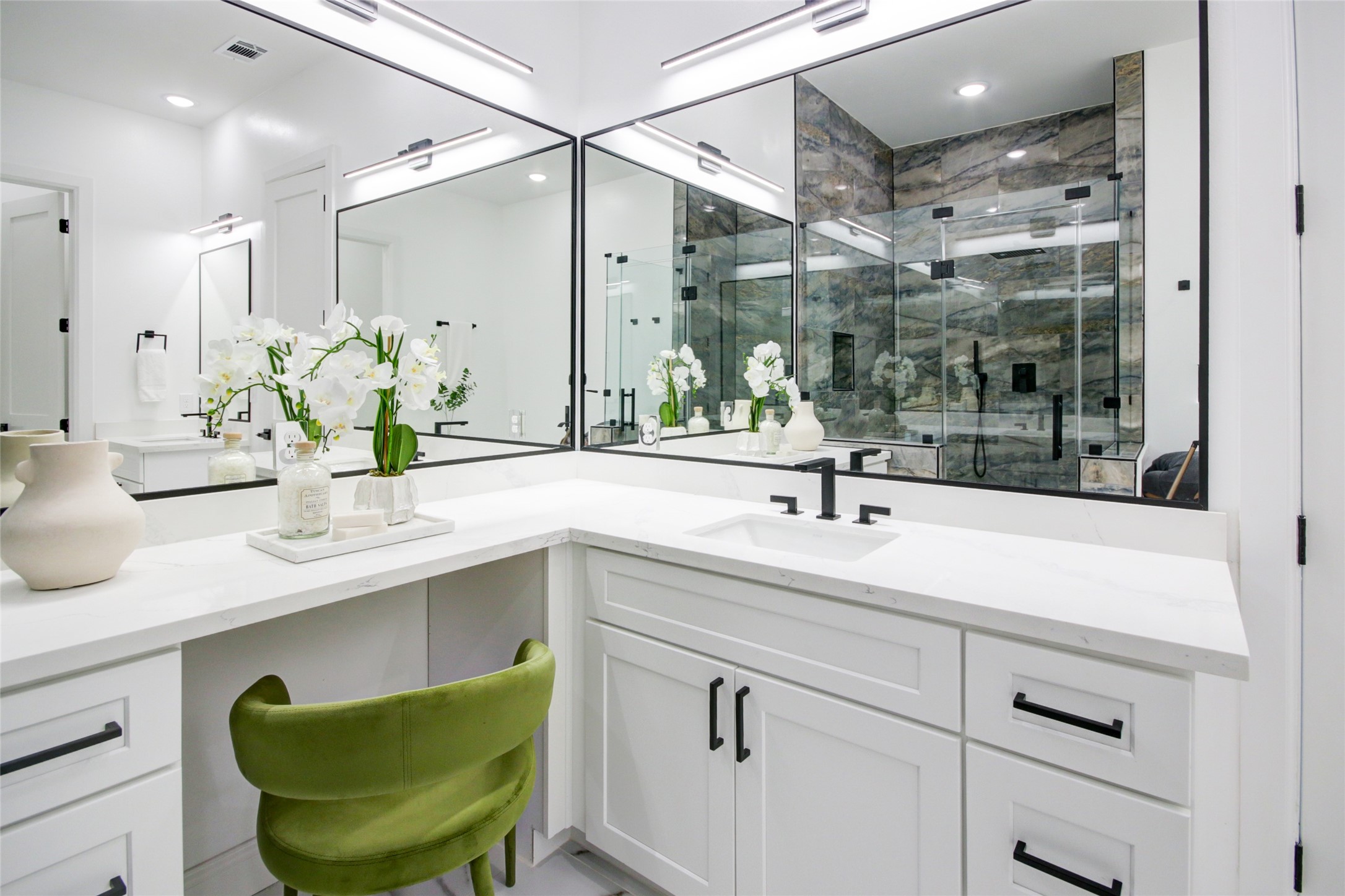1214 West 24th Street, Unit D Houston, TX 77008 - Photo 43 of 45 a bathroom with a sink and a mirror